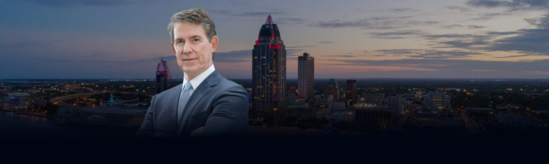 attorney Andy Citrin with city skyline behind him