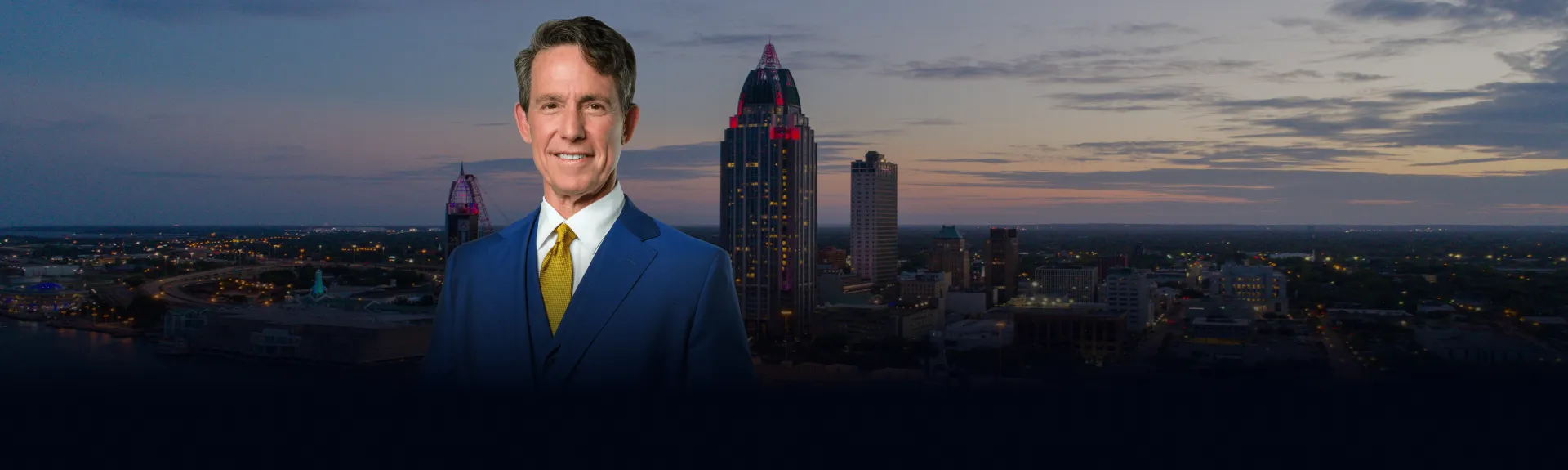 attorney Andy Citrin with city skyline behind him